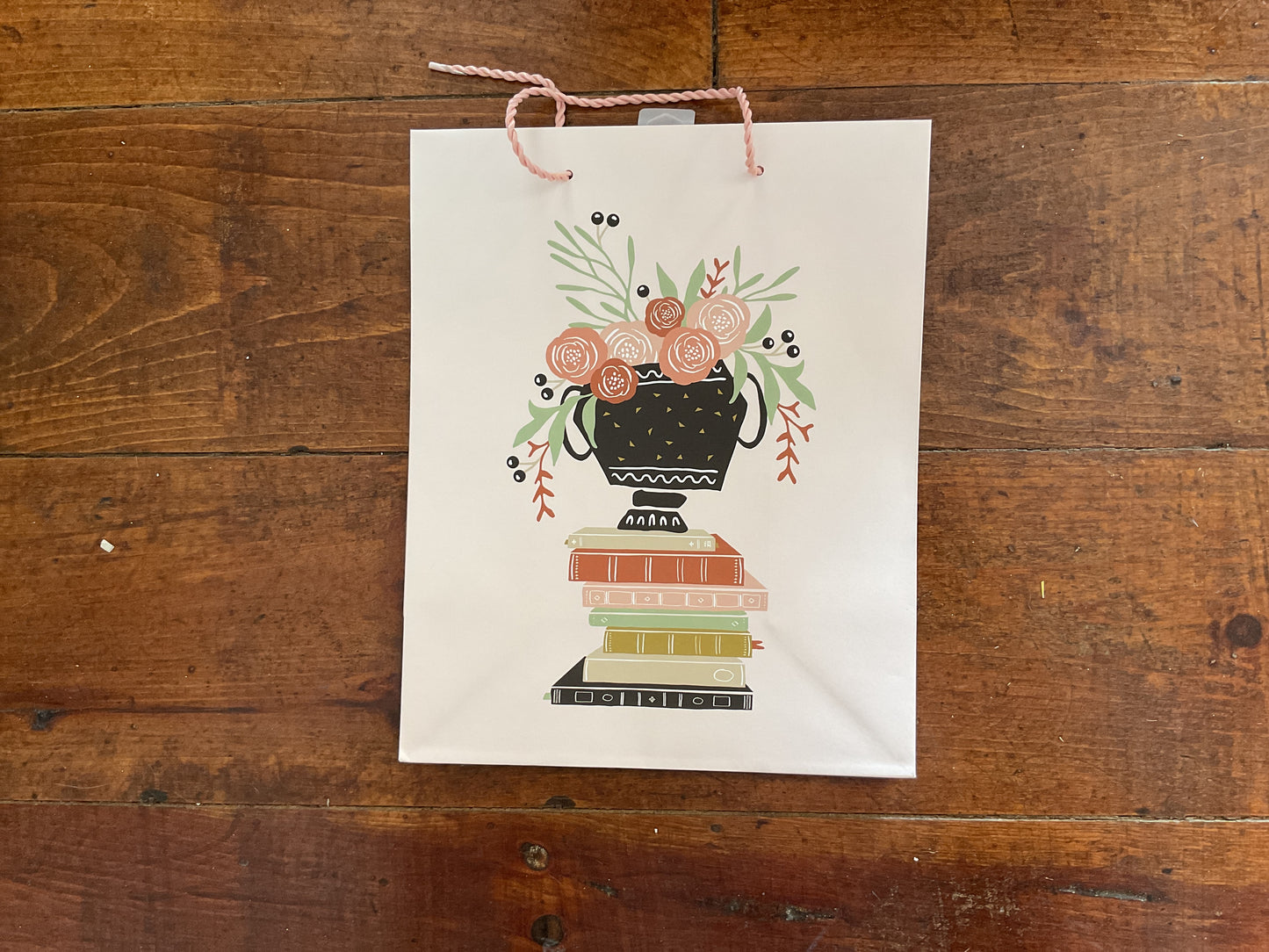 Gift bag book stack with flowers